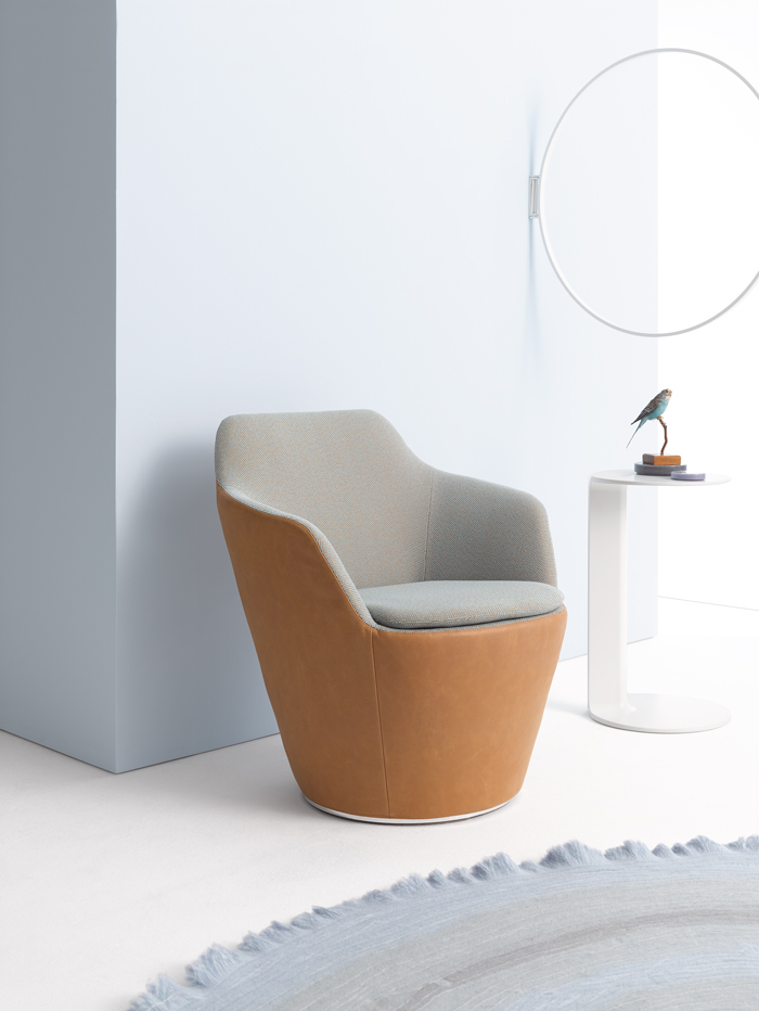 “Flint” is a delicate, compact  rotatable easy chair which takes up a minimum of space, while offering plenty of legroom and outstanding seating comfort
